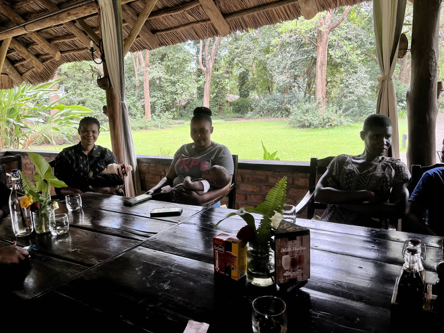 The children eating together at a long table.
